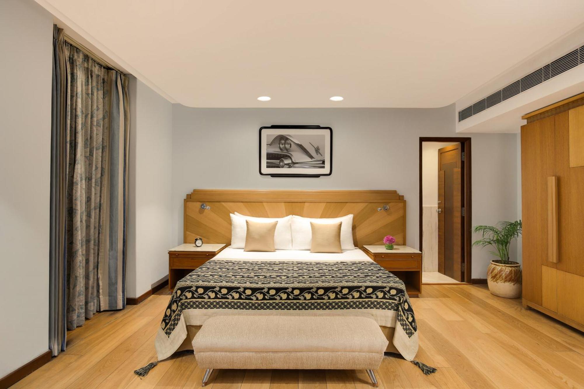 فندق إمباسادور نيودلهي المظهر الخارجي الصورة A bedroom at the Taj Bengal