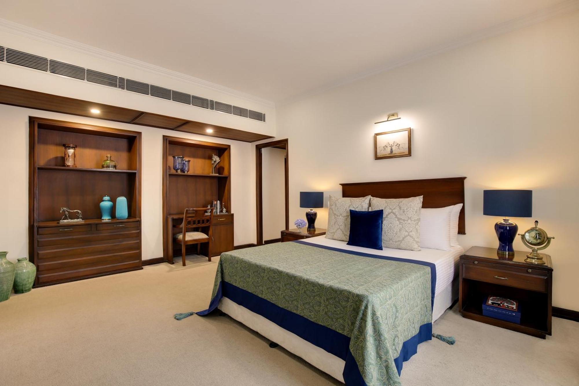 فندق إمباسادور نيودلهي المظهر الخارجي الصورة A bedroom at the Taj Bengal